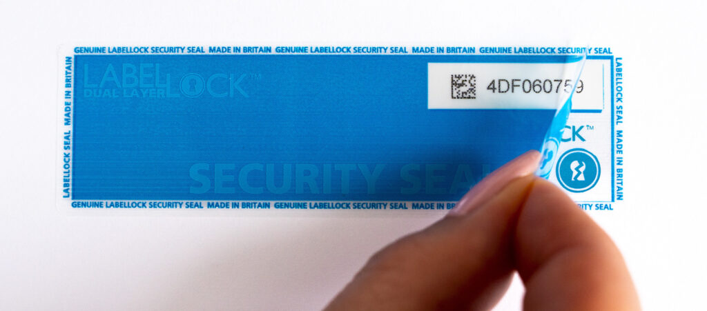 Dual Layer LabelLock® Label starting to be peeled off