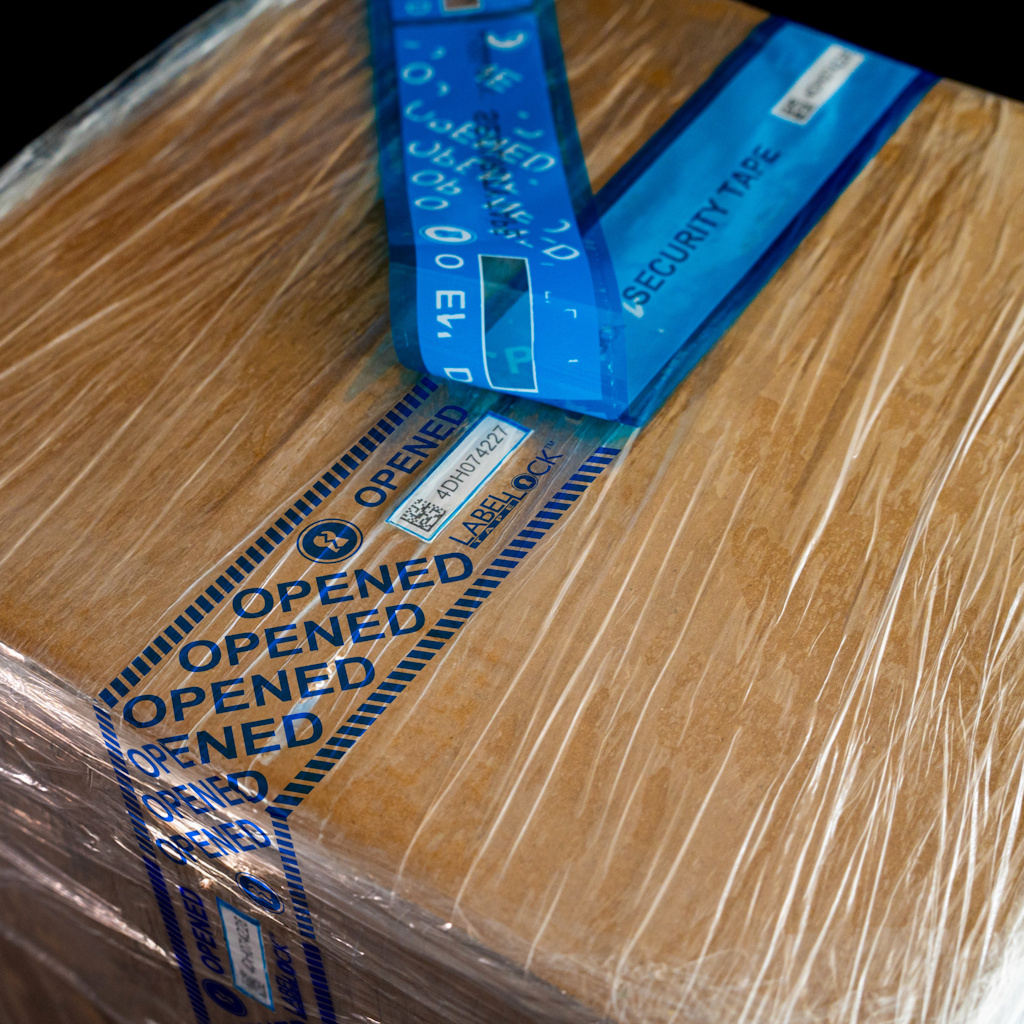 LabelLock® Security Tape sealing a shrink wrapped box